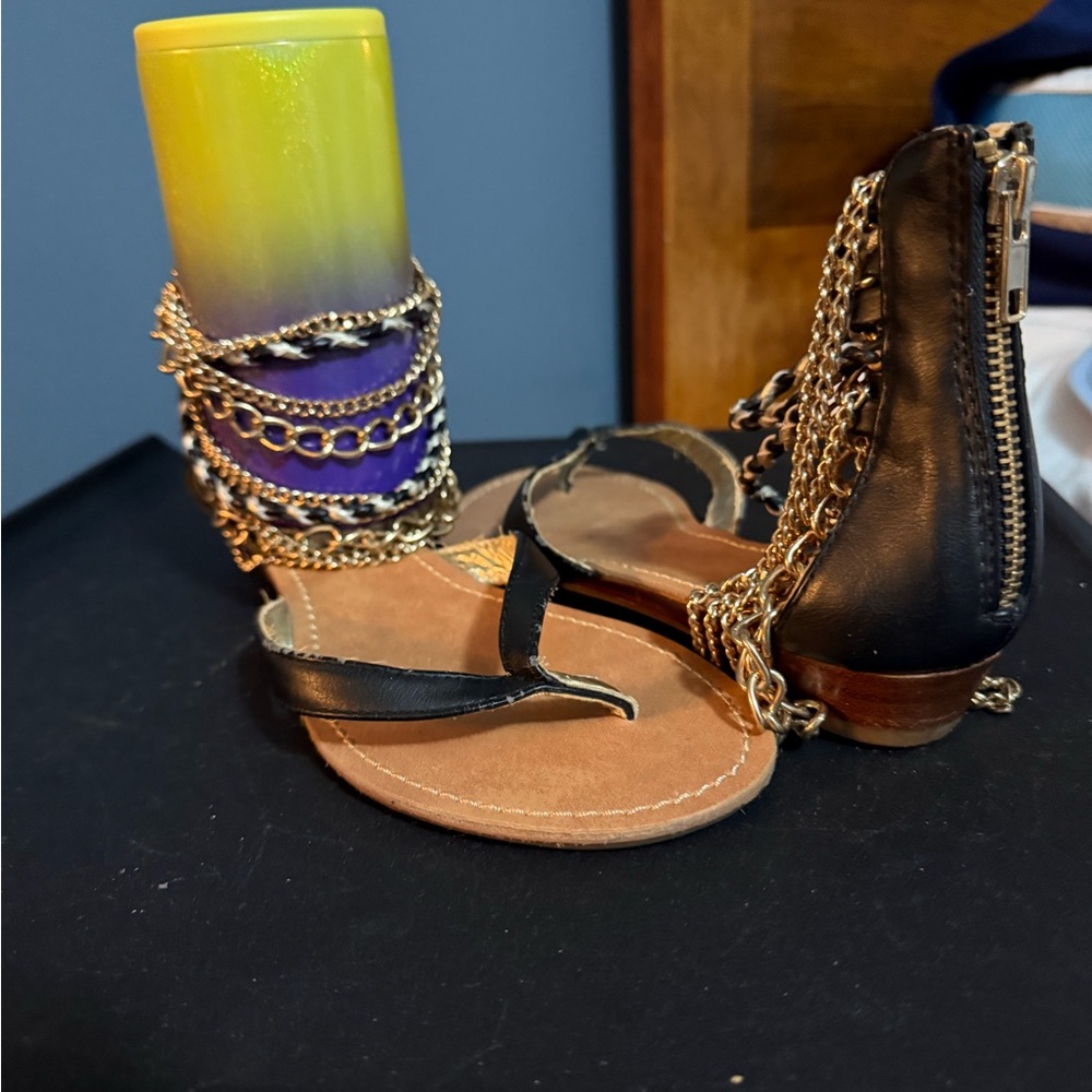 Nine West   
Black Leather Sandals with Gold Chain Detail
